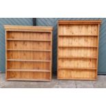 A pine five shelf bookcase, 127 x 20 x 146cm and another similar 116 x 17 x 161cm