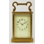 A late 19th century brass striking carriage clock, Arabic numerals, striking the hours and half on a