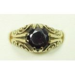 A 9ct gold and garnet single stone ring, N, 4.2gm
