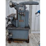 A Harrison horizontal and vertical milling machine with attachments, for sale due to closure of