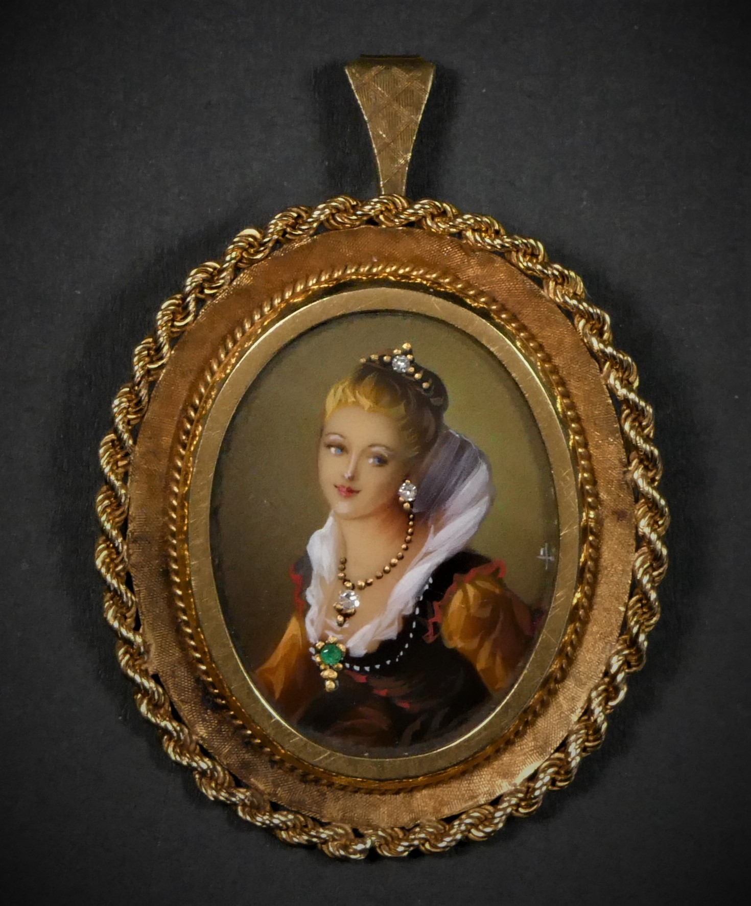 An Italian 18ct gold portrait miniature locket/brooch, London import 1969, depicting a lady in