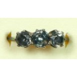 A 9ct gold and silver three stone paste ring, P, 2.1gm