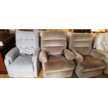 An electric reclining/riser armchair in mottled beige fabric, a matching manual recliner and a grey