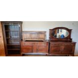 An oak panel front coffer, 111 x 52 x 47cm, a stained pine five shelf bookcase, 91 x 35 x 183cm,