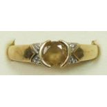 A 9ct gold yellow gemstone and diamond dress ring, N, 2.9gm