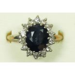 A 9ct gold sapphire and diamond cluster ring, R, 3.7gm