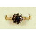 A 9ct gold and garnet cluster ring, Birmingham 1968, O, 2gm