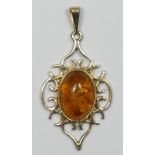 A 9ct gold and amber pendant, stone 14 x 10mm, 3.1gm