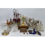 A Russian glass bottle set, three red glass bottles with etched floral decoration, in plate ware