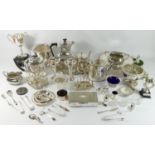 A four piece electroplated tea service, of half fluted form and a quantity of plated wares.