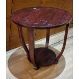 A Art Deco oak side table, with tapered legs, padded feet and lower shelf, 54cm diameter, 52cm tall