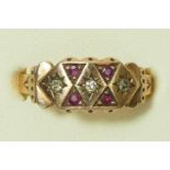 A Edwardian style 9ct rose gold ruby and diamond panel ring, N, 2.9gm