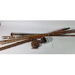 An Allcocks three piece split cane fly fishing rod, two other rods and two unsigned wooden fishing