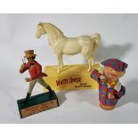 A White Horse Fine Old Whiskey display figure, in the form of a white horse on a plinth, 26cm,