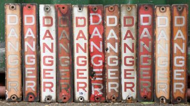 Eleven enamel single sided signs, Danger, 5cm x 30cm