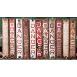 Eleven enamel single sided signs, Danger, 5cm x 30cm