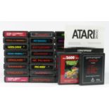 Twenty Six Atari cartridges, to include Air-Sea Battle, Asteroids, Battlezone, Centipede (with