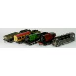 A Hornby clockwork / wind up O gauge loco and tender, 45746 in BR green livery, a Hornby clockwork /