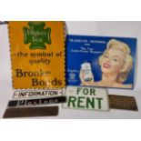 A collection of tin and cast metal signs, to include Edglets Brooke Bonds, Marilyn Monroe