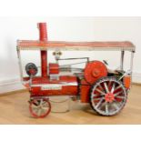 A Meccano shop display, traction wagon, spinning steam valve, red, powered, 78cm x 46cm x 27cm