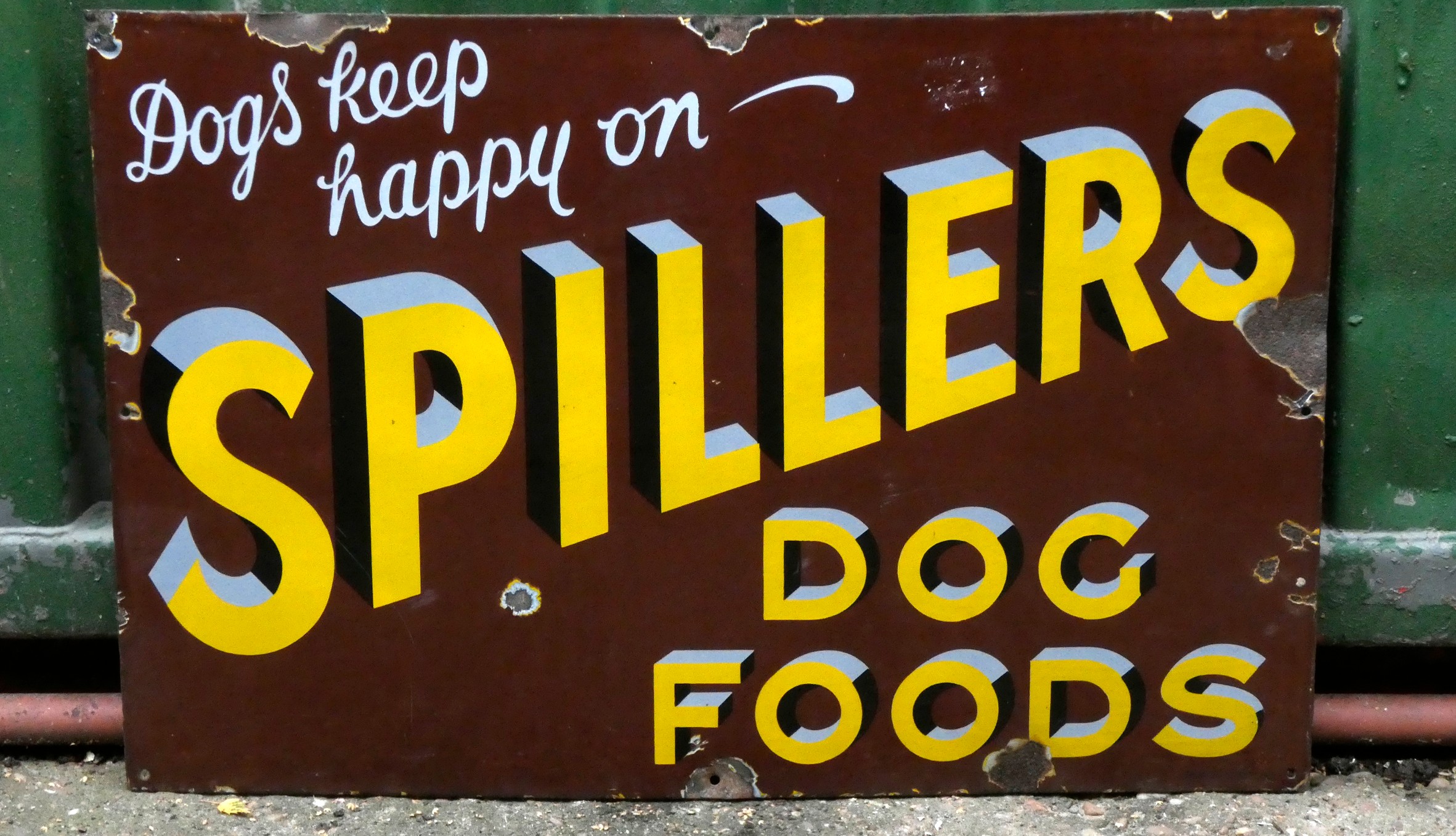 A vitreous enamel single sided sign, Spillers Dog Food, 77cm x 51cm