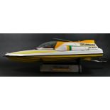 Academy Sea Dagger, c.2000, a radio controlled speed boat, single screw out board motor, stand, 80 x