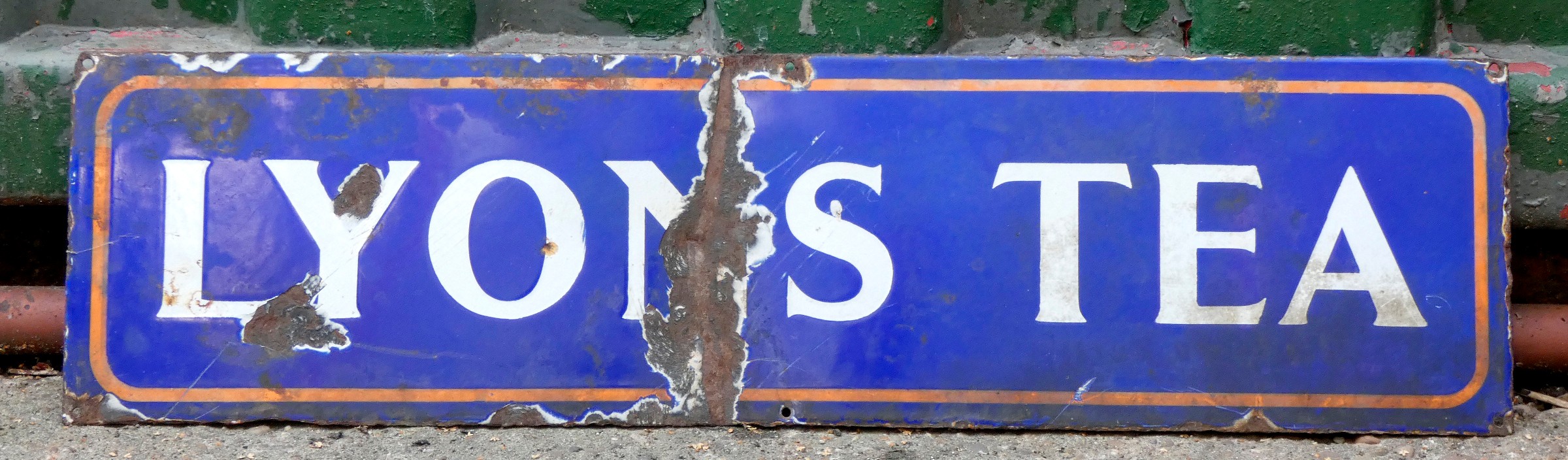 Lyons Tea, a single sided vitreous enamel advertising sign, 18 x 69cm.