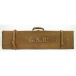 A vintage leather and canvas shotgun case, initialed G.S.R. and a leather shotgun case (2).