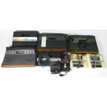 FOR SPARES OR REPAIRS, an Atari 2600 U (serial No 810749), an Atari 2600 U (serial No 548256654),