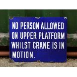 B.R.(E), a single sided vitreous enamel sign, NO PERSON ALLOWED, ON UPPER PLATFORM, WHILST CRANE