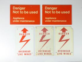 Five plastic railway signs, 'Danger overhead live wires' (3) and Danger not to be used - appliance