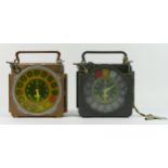 Two Junior Natural Antwarp pigeon timing clocks, one with metal body, the other plastic, sold by