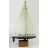 A radio controlled plastic fractional rig model sail boat, lead bulb keel, control unit, stand, 79 x