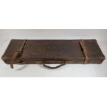 A vintage leather bound, wood framed shogun case, initialed W.P.G. with a cleaning rod