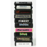 Ten Atari cartridges, to include Amidar, E.T., Frogs & Flies, Atlantis, Gangster Alley, Forest,