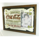 A vintage Coca-Cola advertising mirror, 55 x 80cm.