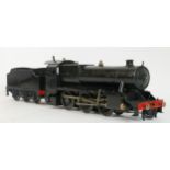 A Bassett-Lowke 0 Gauge Live Steam LMS 2-6-0 Locomotive and six wheel Tender, finished in black,