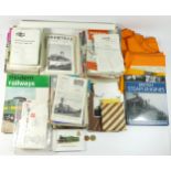 Box of sundry railway items including two orange hi-vis vests with double arrow logo, 29 large