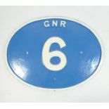 Oval cast iron railway bridge plate, GNR 6, 43 x 32cm.