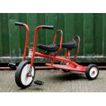 A two seater child's trike, by Beleduc Trikes, 90cm x 65cm x 49cm