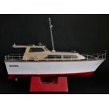 Sea King, a radio controlled power boat with fibreglass hull and timber deck and superstructure,