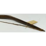 A Canadian bow with cross hatched carved decoration, 148cm, with owners label "Captain Cooks
