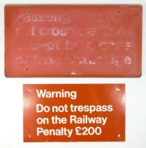 Two metal railway signs, 'Warning do not trespass on the railway. Penalty £200', 35 x 20cm, and '
