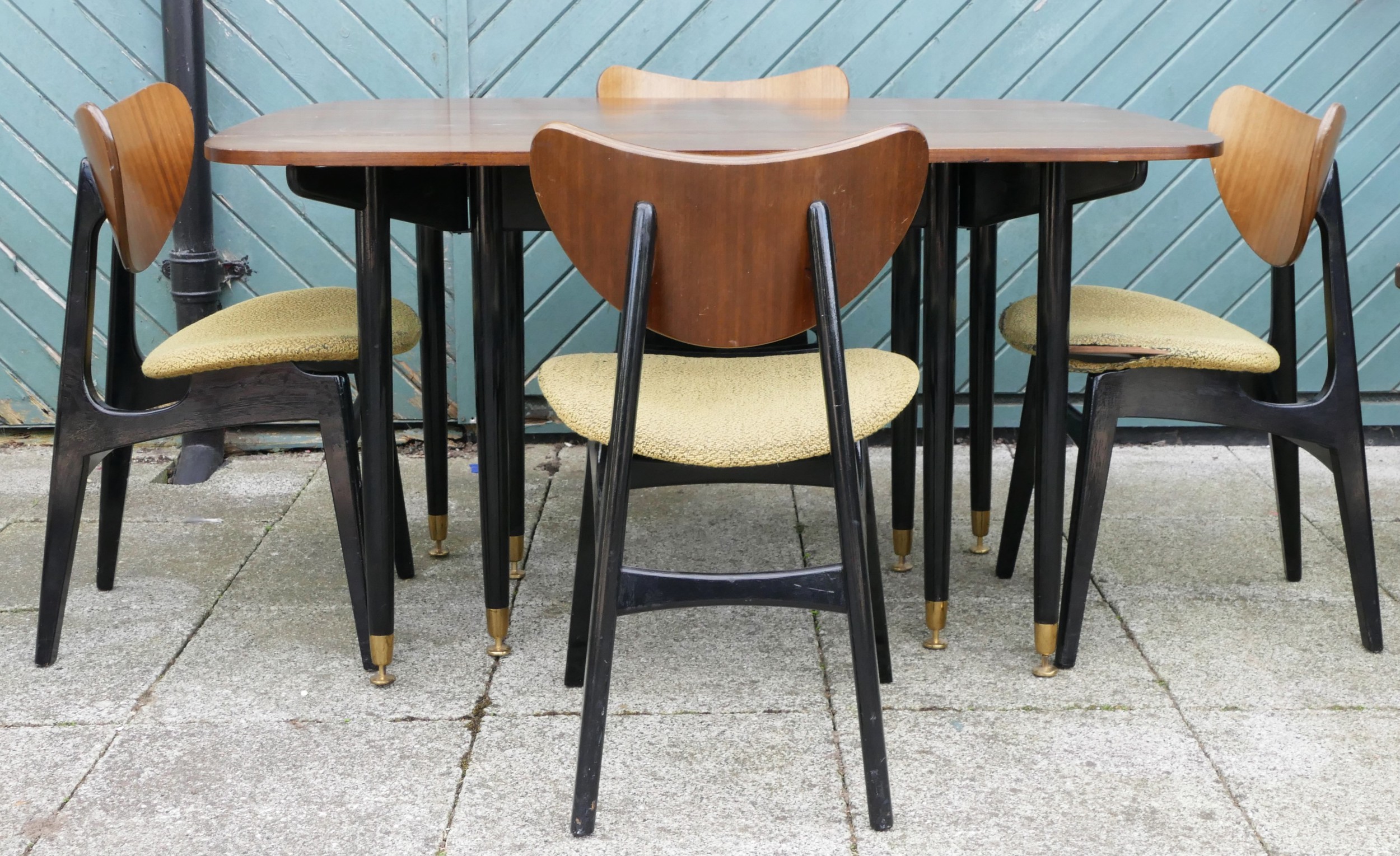 E.Gomme for G-Plan 1950s Librenza tola wood drop leaf dining table with gateleg action, ebonised