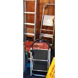A Black & Decker Workmate 400, together with four step ladders (5).