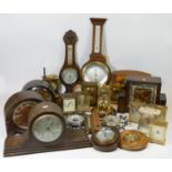 A collection of 20th century and later mantel clocks, wall clocks and barometers, manual & quartz