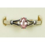 A 9ct white gold, pink sapphire and brilliant cut diamond ring, N, 2.4gm