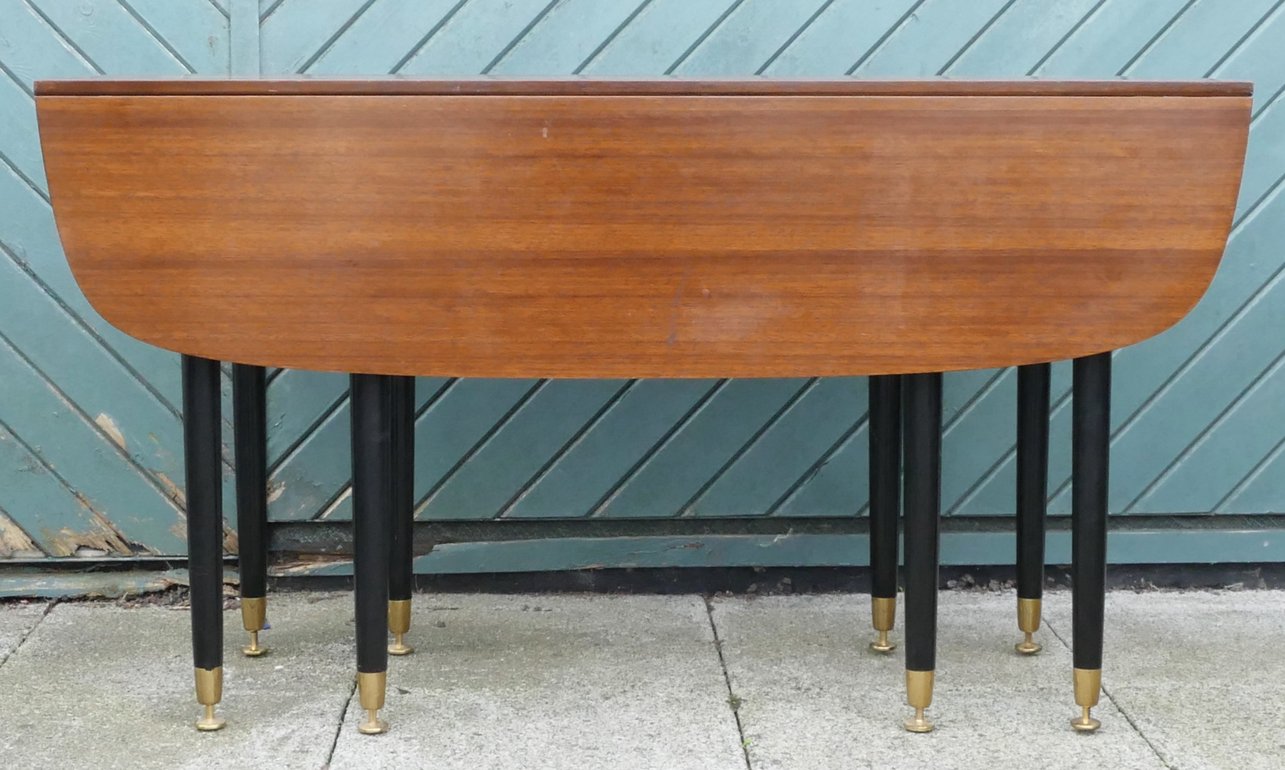 E.Gomme for G-Plan 1950s Librenza tola wood drop leaf dining table with gateleg action, ebonised - Image 2 of 11