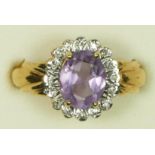 A 9ct gold amethyst and diamond cluster ring, Q, 3.1gm