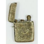 A silver vesta case converted to a cigarette lighter, Birmingham 1918, initialed.